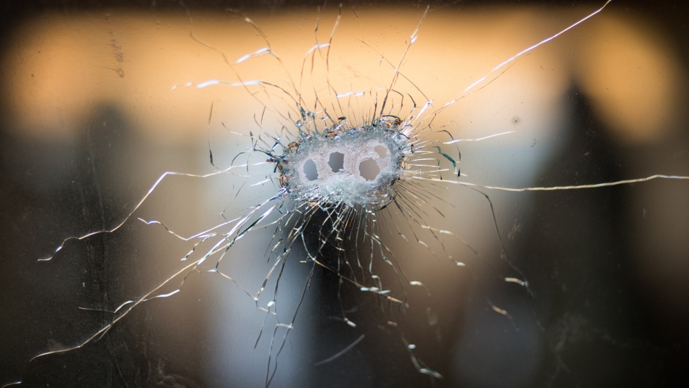 Bullet holes in a front windshield terrorism