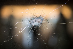 Bullet holes in a front windshield terrorism
